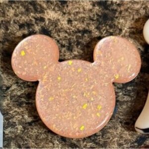 Sparkling Disney pop socket on hold